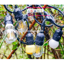 Luces para exteriores con 15 luces (3 bombillas S14 adicionales) y cable de extensión a juego con 13 pies - Commercial Weatherproof Patio St